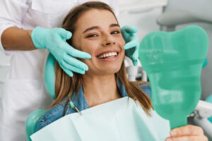 Dentist explaining tooth crown procedure in a modern office
