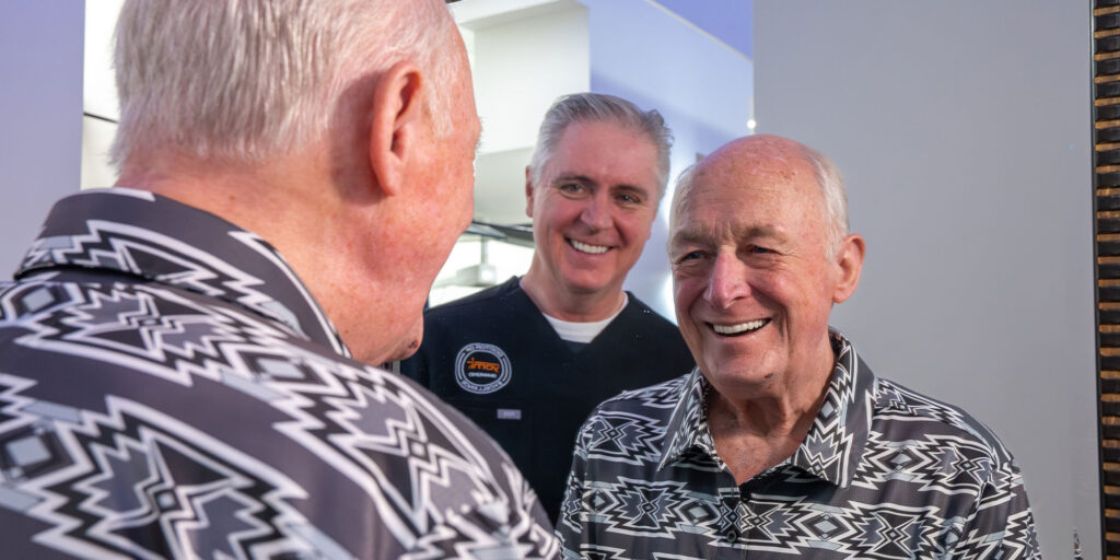 patient with pattern collared shirt during smile revel