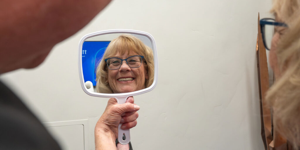 full mouth implants patient with smile reveal