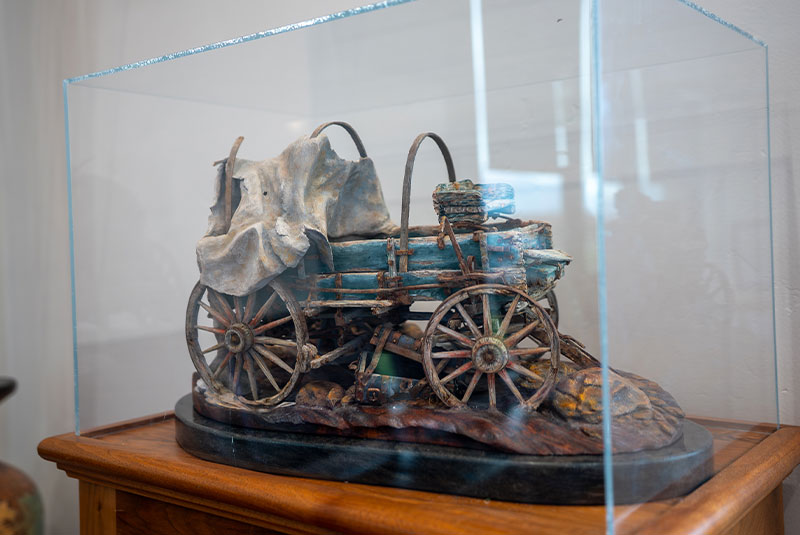 sculpture of wagon in lobby